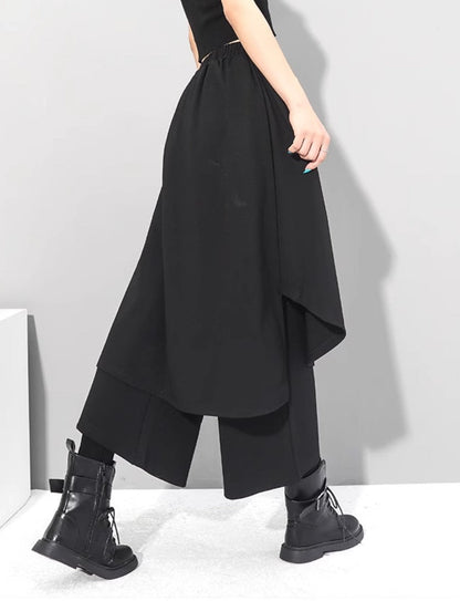 中性的 アシンメトリー袴パンツ フェイクレイヤード ブラック ９分丈 ／TEA