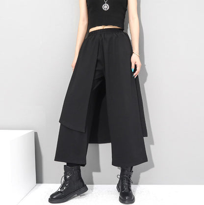 中性的 アシンメトリー袴パンツ フェイクレイヤード ブラック ９分丈 ／TEA