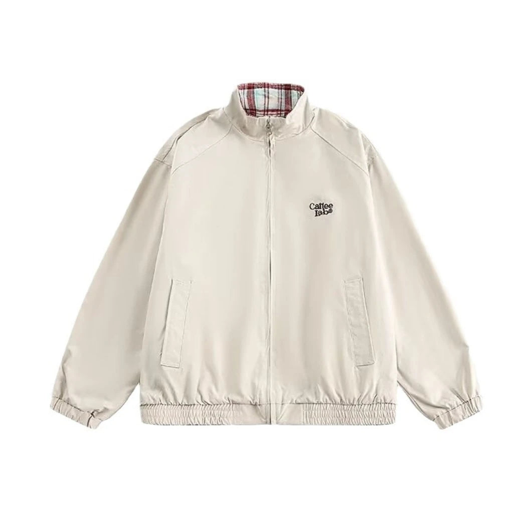 アプリコット無地側のリバーシブルジャケットの商品写真（正面）。