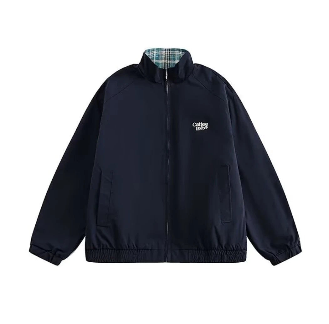 ネイビー無地側のリバーシブルジャケットの商品写真（正面）。